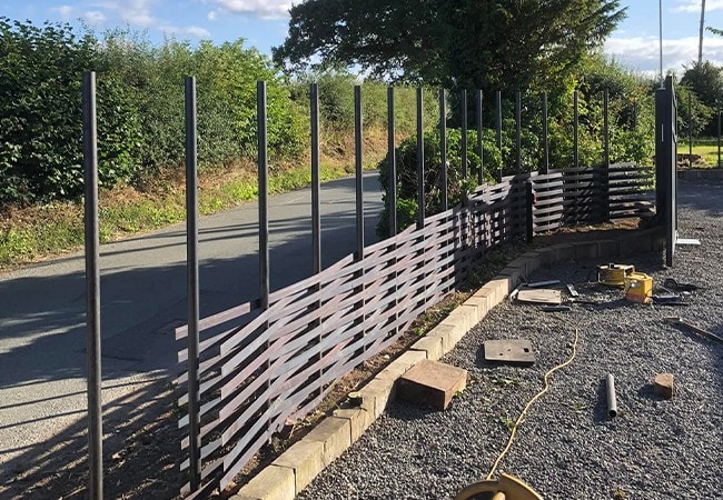 Several rows of the woven metal have been completed.