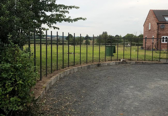 Poles to begin the woven fence process.